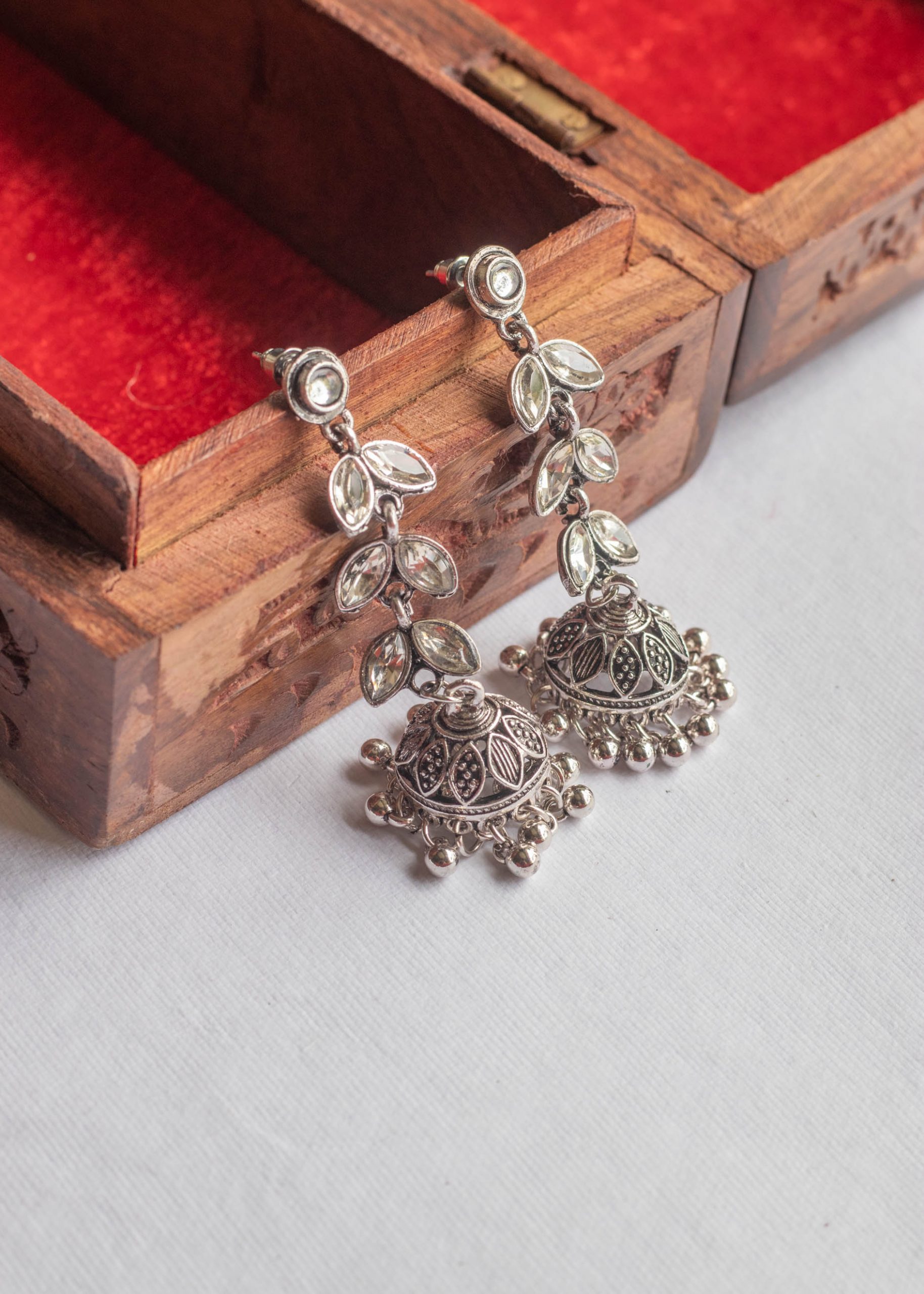 SWAASHSTORE Silver Leaf Stone Dangler Jhumka Earrings