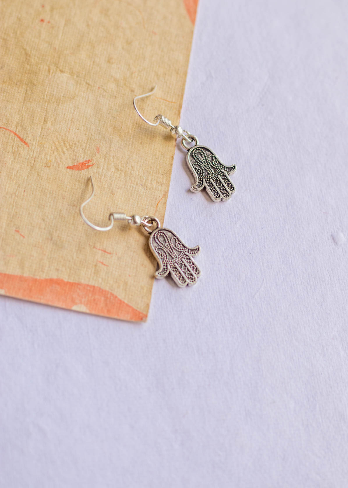 Quirky Silver Tiny Hand Dangler Earrings