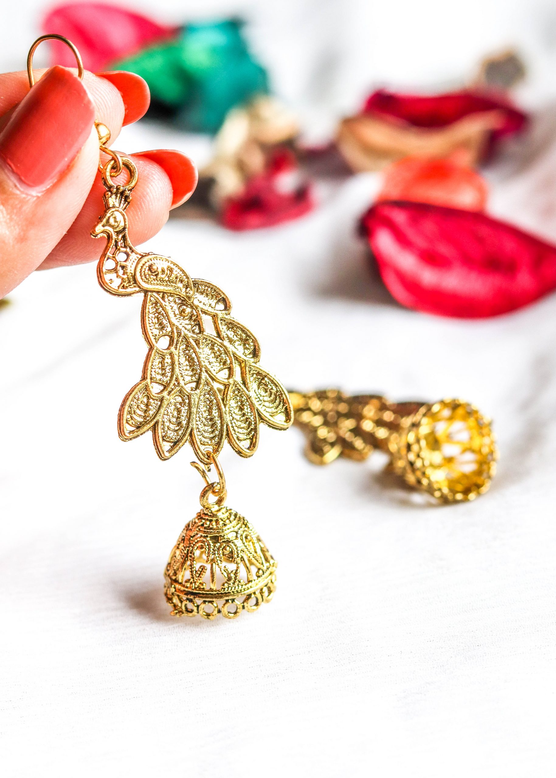 Gold Peacock Jhumka Earrings