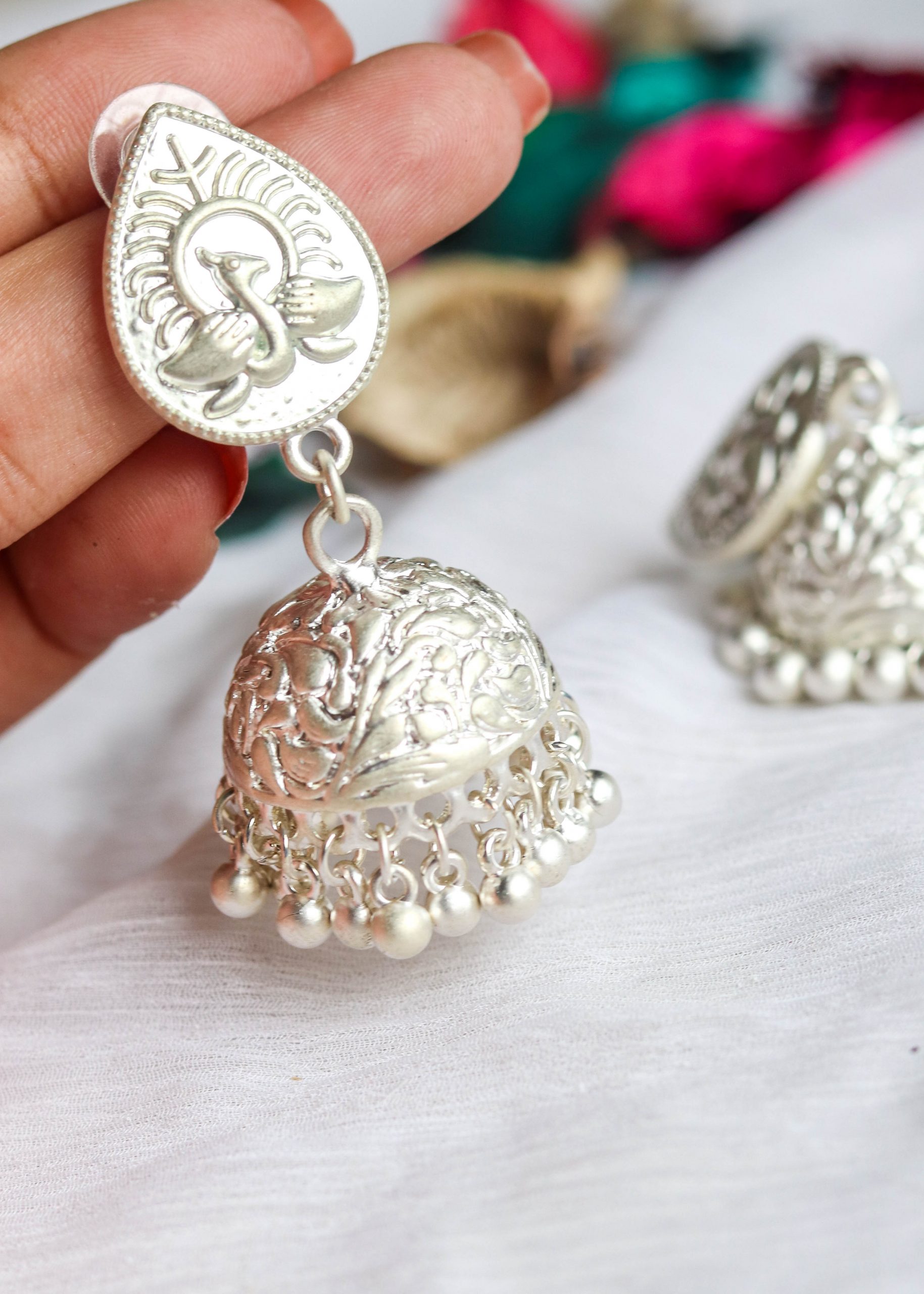 Silver Polish Peacock Jhumka Earrings